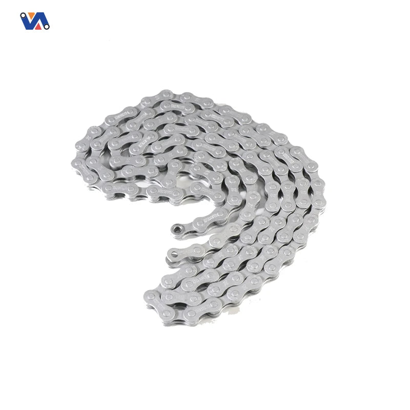 Silver-coloured OUXI V8 bicycle chain coiled on a white background
